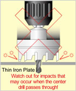 Watch out for impacts that may occur when the center drill passes through!